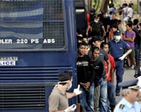 Refugees rehoused in Greece as temperatures drop