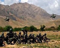 Afghan forces mount offensive around besieged southern city