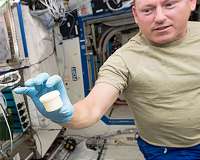 Science Launching to Space Station Looks Forward and Back