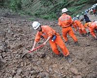 Dozens still missing in China landslide as hopes fade