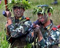 Japan hails thaw with China but worried about military