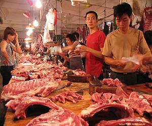 China farmers held for selling meat from sick pigs