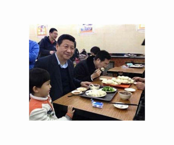 Xi's 'Chinese Dream' flickers in one Beijing neighbourhood