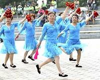 China's government to 'manage' public dancing: Xinhua