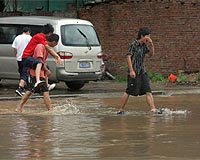 Death toll in torrential rain in China rises to 38: state media