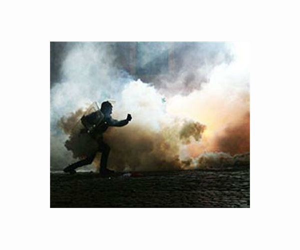 Nepal police fire tear gas as MPs debate US grant