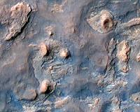 NASA Mars Orbiter Spies Rover Near Martian Butte