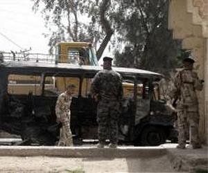 Iraq on alert after attacks kill at least 100