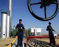 China to charge six dollars a barrel to develop Iraq field
