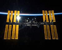 ISS dodges debris as crew readies for space walk