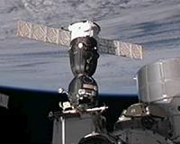 Russian, German and US astronauts dock with ISS