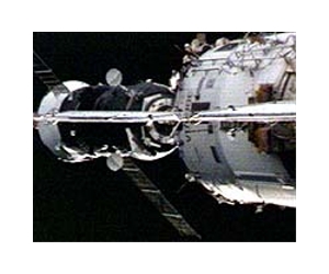 Russian Progress Freighter Docks Manually With ISS