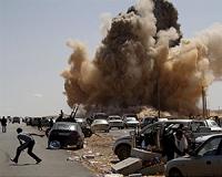 Two killed in air strike on shopping area in Libya