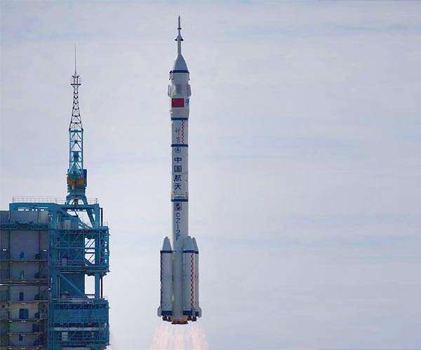 China sends three astronauts to complete space station
