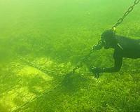 Boat mooring chains scour seagrass releasing CO2