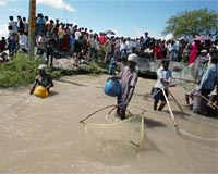 50,000 Nepalis flee after dam burst