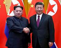 N. Korea's Kim asked China's Xi to help lift sanctions: report