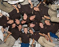 Stowage And EVAs Occupy Shuttle And Station Crews