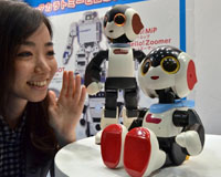 Japan toymaker unveils tiny talking, singing humanoid