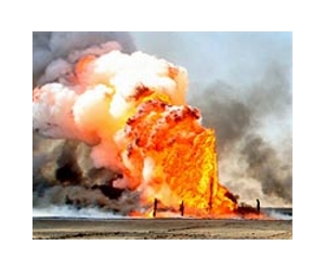 Blasts partially halt output at south Iraq oil field
