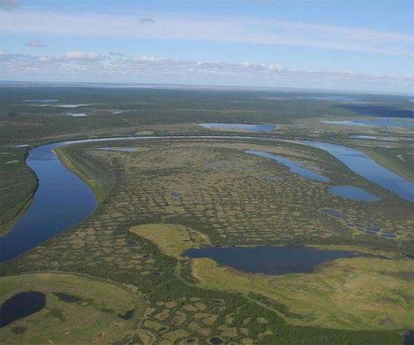 Russia says 'colossal' amount of river water approaching Siberian city