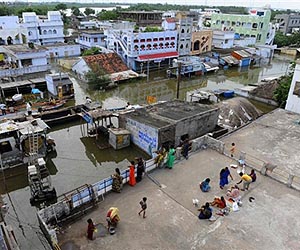 Two million flee India floods as aid effort struggles