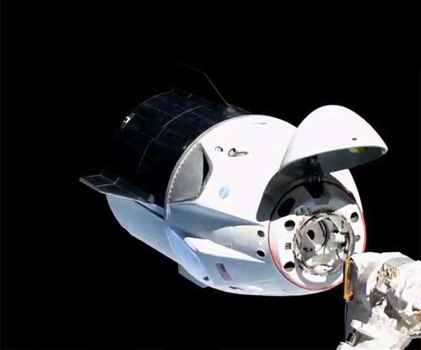 Astronauts prepare for most crowded space station in years