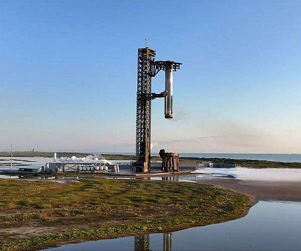 In a first, SpaceX 'catches' megarocket booster after test flight