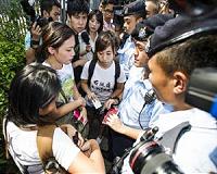 Hong Kong democracy protesters dig in at government HQ