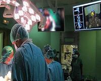 Patient wears 3-D glasses during brain surgery