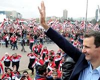 Obama says Assad must go, pushes campaign against IS