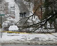 Snowstorm brings drudgery and tragedy to US east