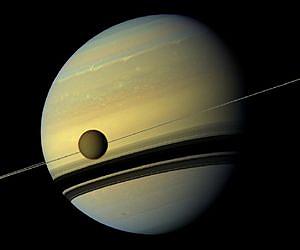 Titan, Saturn's Largest Moon, Icier than Scientists Thought