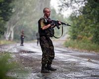 Ukraine, separatists launch troop withdrawal