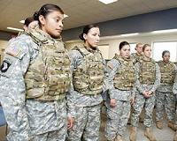 British PM wants women training for front line in 2016