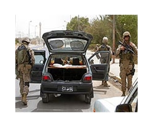 US sticks to Iraq timetable, says only 'dozens' might stay