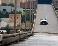 Mississippi levee buckles under rising waters