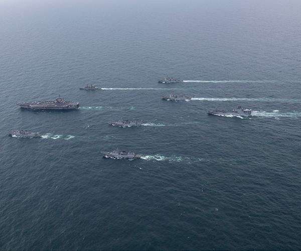 US orders carrier group to hasten Middle East arrival